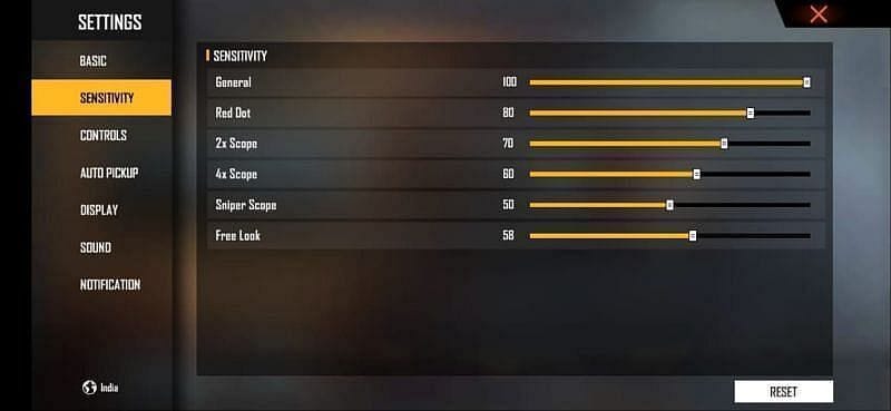 how to drag aim with free fire sensitivity settings Free Fire player dragging aim on phone screen